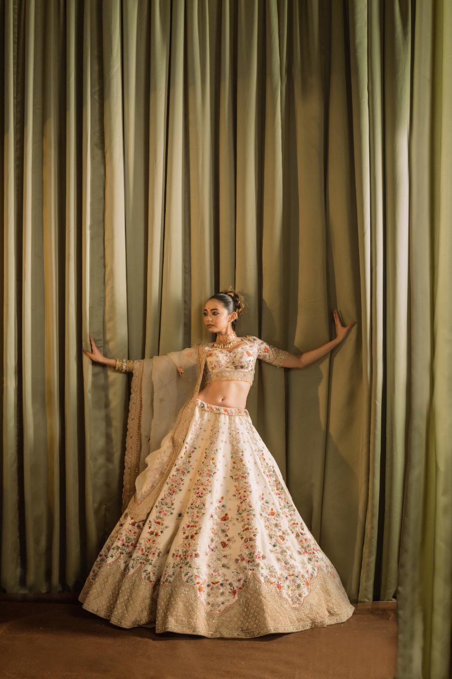 Ivory Raw Silk Resham Hand Work Lehenga Set