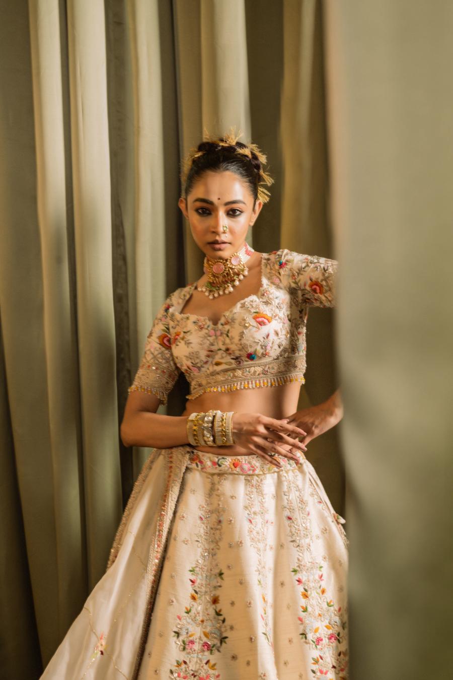 Ivory Raw Silk Resham Hand Work Lehenga Set