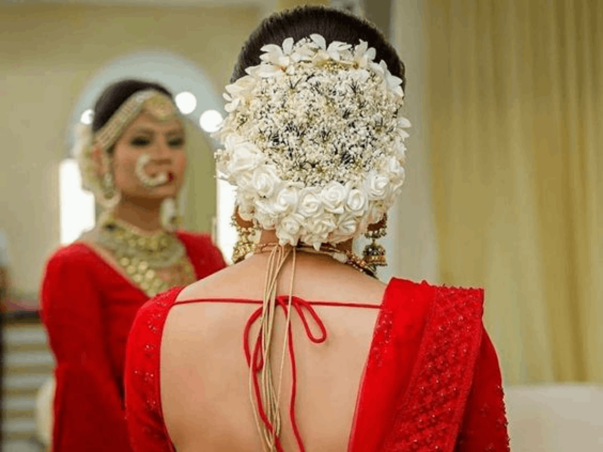 Fabulous Juda Hairstyle for Bride in Lehenga